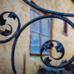 Old wrought iron gate, a beautiful curls